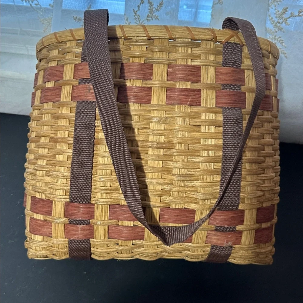 Woven vegetable basket with handles — carrot plaque decor